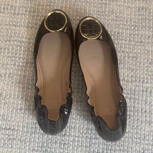 Tory Burch Black Flats with Gold Accents